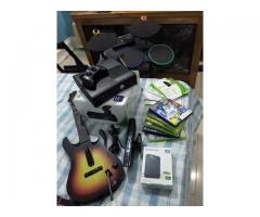 Modified Xbox 360 with accessories drums & guitar